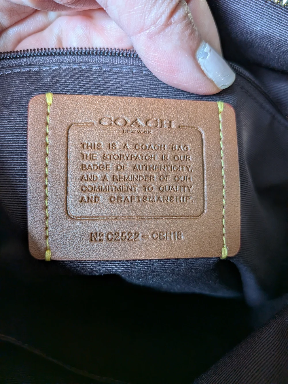 Coach Jude Duffel Bag in Black Pebbled Leather with Gold Hardware